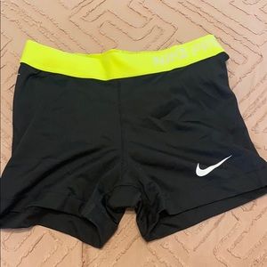 Two small pairs of Nike pros